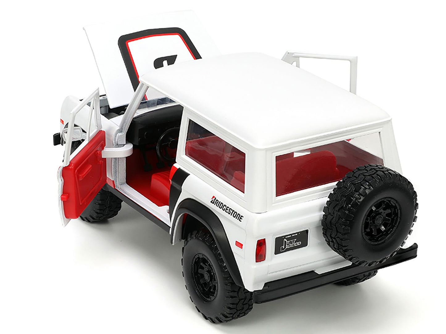 Jada 1973 Ford Bronco #008 White with Red and Black Stripes and Red Interior with Extra Wheels "Just Trucks" Series 1/24 Diecast Model Car by Jada
