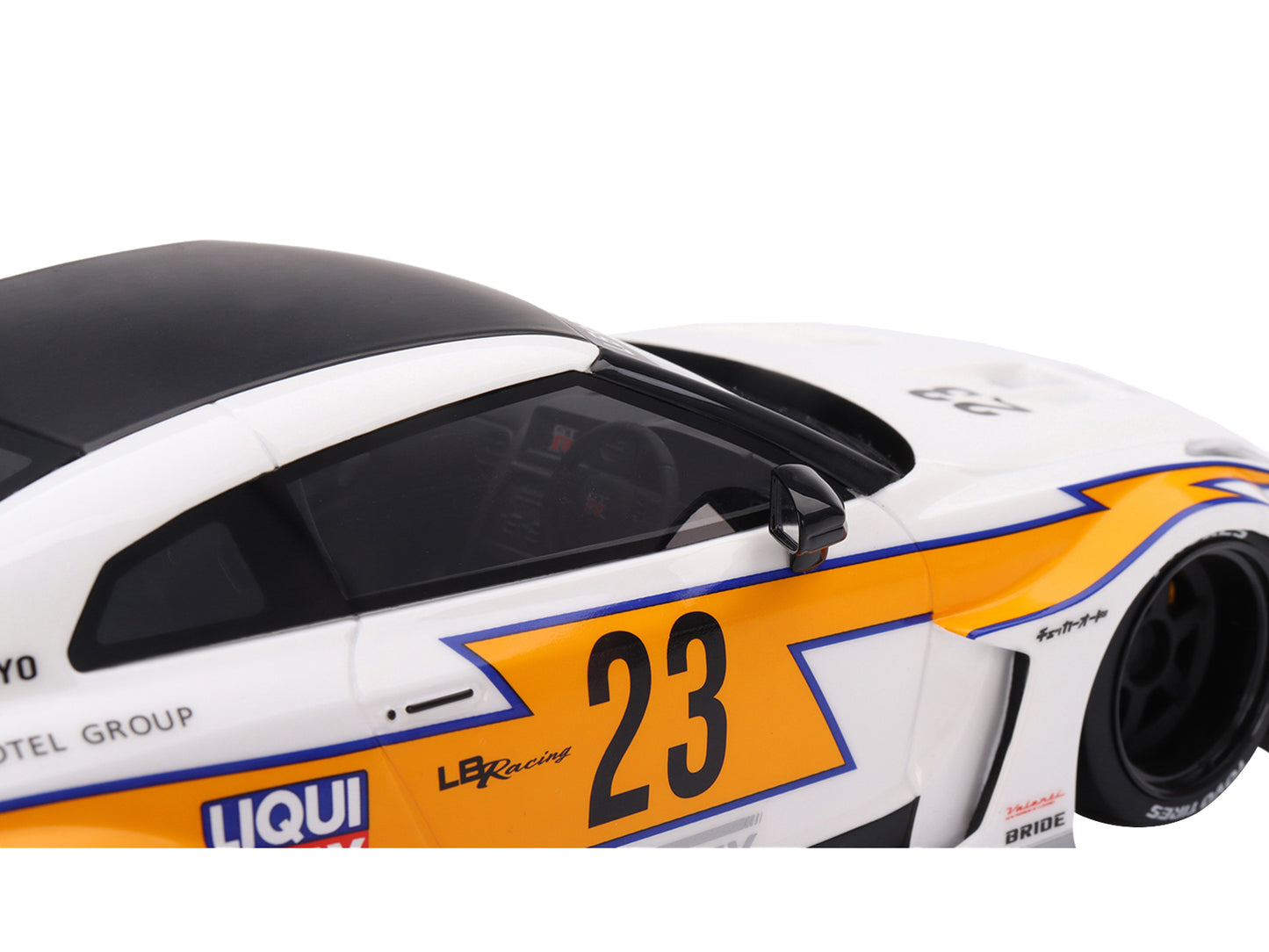 Top Speed Nissan LB-Silhouette WORKS GT 35GT-RR Ver.1 RHD (Right Hand Drive) #23 White with Yellow Stripes "LB Racing" 1/18 Model Car by Top Speed