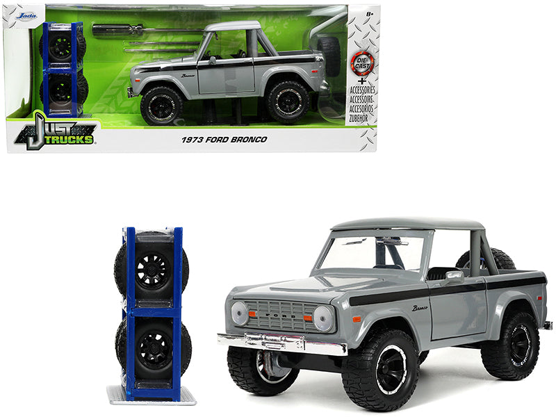 Jada 1973 Ford Bronco Pickup Truck Gray with Black Stripes with Extra Wheels "Just Trucks" Series 1/24 Diecast Model Car by Jada