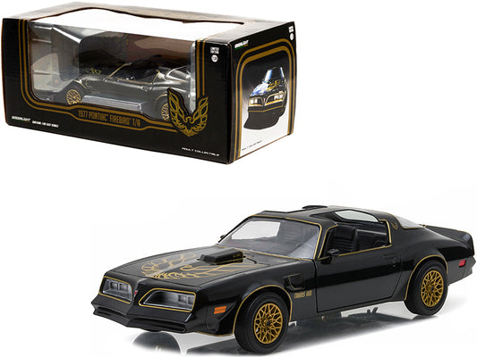 Greenlight 1977 Pontiac Firebird Trans Am T/A Starlite Black with Golden Eagle Hood and Stripes 1/24 Diecast Model Car by Greenlight