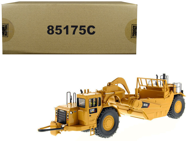 Diecast Masters CAT Caterpillar 657 G Wheel Tractor Scraper with Operator "Core Classics Series" 1/50 Diecast Model by Diecast Masters