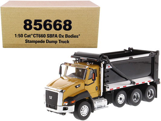 Diecast Masters CAT Caterpillar CT660 SBFA with Ox Bodies Stampede Dump Truck Yellow and Black 1/50 Diecast Model by Diecast Masters