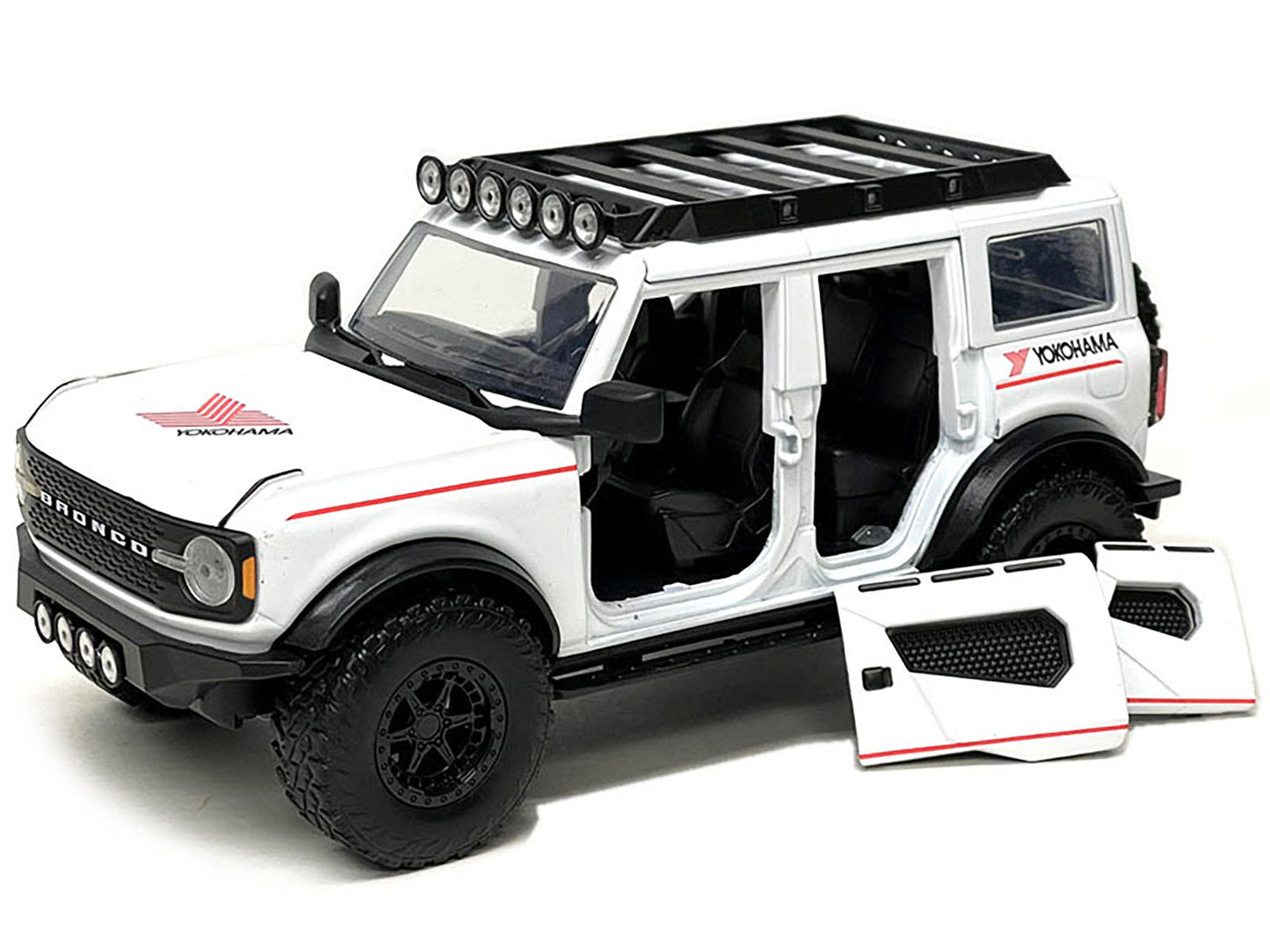 Jada 2021 Ford Bronco White with Red Stripes and Roof Rack "Yokohama Tires" "Just Trucks" Series 1/24 Diecast Model Car by Jada