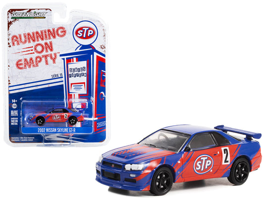 Greenlight 2002 Nissan Skyline GT-R (R34) #2 Blue with Red Graphics "STP" "Running on Empty" Series 15 1/64 Diecast Model Car by Greenlight